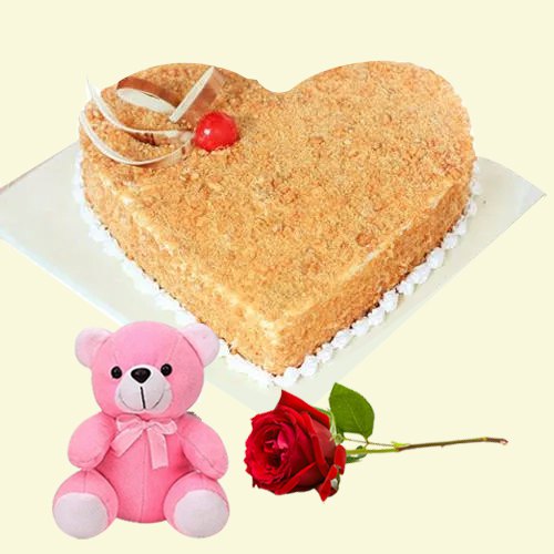 Delicious Heart Shaped Butter Scotch Cake with Single Rose and Teddy