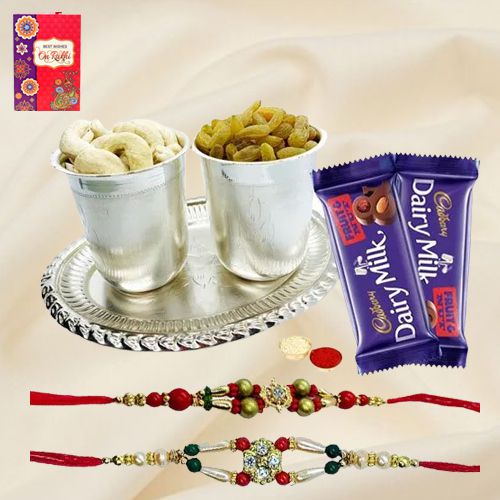 Delicious Dry Fruits Hamper in Silver Plated Glasses and Tray with Cadburys Dairy Milk Fruit n Nut