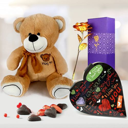 Resplendent Valentine Gift of Hug Me Teddy with Heart Chocolate n Golden Rose