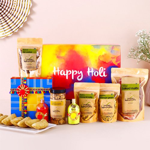 Attractive Gift of Assorted Treats with Gujiya N Organic Gulal