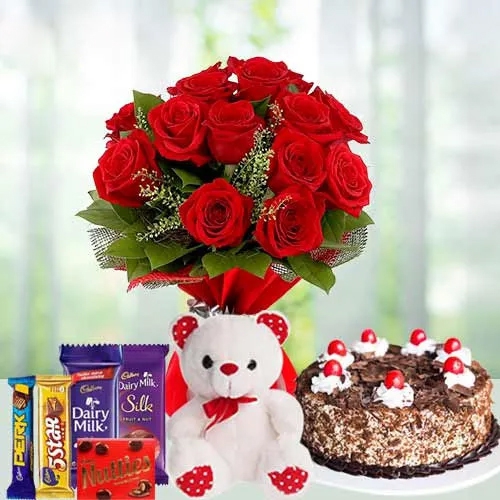 12 Exclusive  Dutch Red  Roses  Bouquet with Cake , Cadburys Assorted Chocolates and  a Cute Teddy Bear
