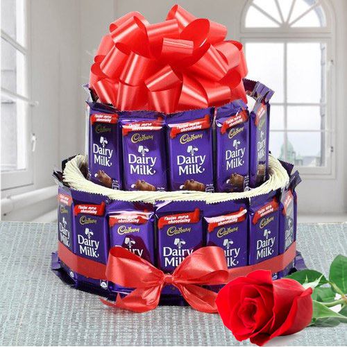 Marvellous 2 Tier Arrangement of Cadbury Dairy Milk Chocolates with Single Red Rose