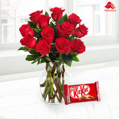 Exclusive Dutch Red Roses in Vase with free Cadburys Chocolate