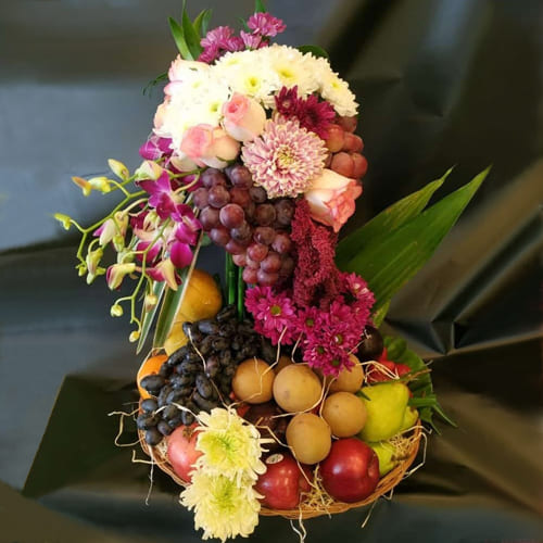 Beautiful Tall Arrangement of Flowers n Fruits