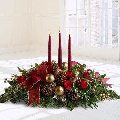 Wonderful Centerpiece of Roses N Gerberas with Candles