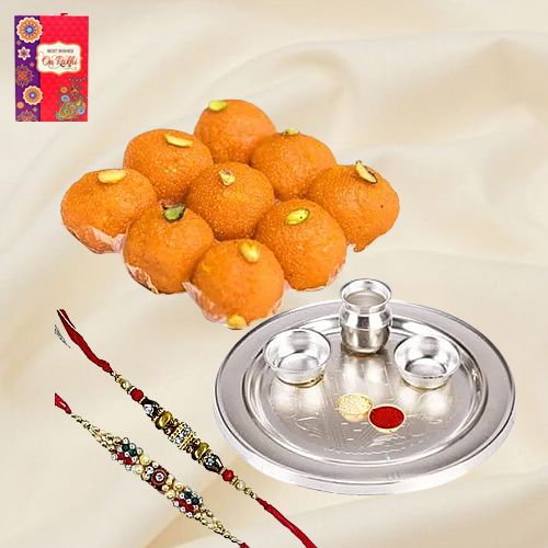 Pride to Possess Silver Plated Thali with Haldiram Ghee Ladoo & 2 Designer Rakhi and Roli Tilak Chawal