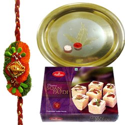 Traditional Combo Gift of Gold Plated Thali and Tasty Haldiram Soan Papri with Free Rakhi Roli Tilak and Chawal